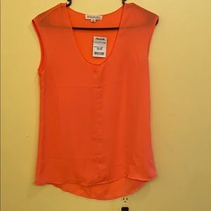 Peach colored blouse